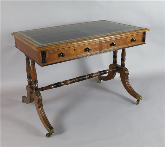 A Regency parcel ebonised oak writing table, W.3ft 6in. D.2ft 3in. H.2ft 6in.